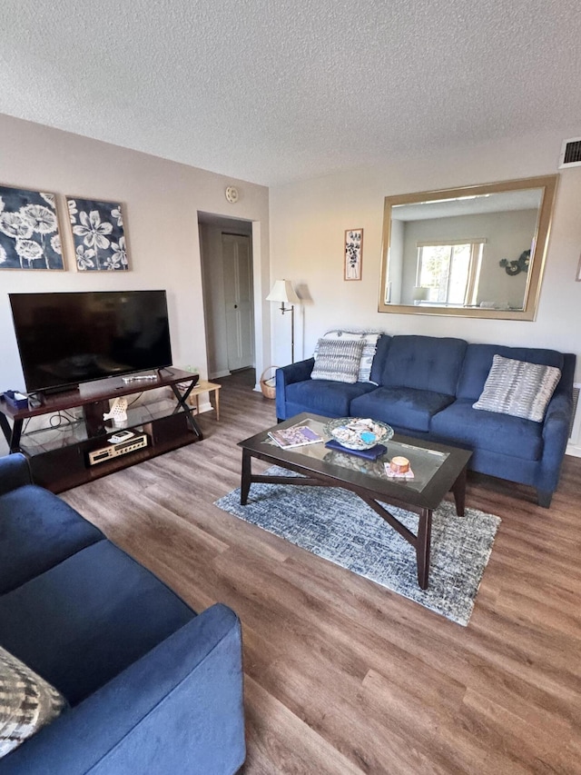 326 Knotty Pine Cir Unit C-2, Greenacres, FL 33463 - living room with wood finished floors, a textured ceiling, and baseboards
