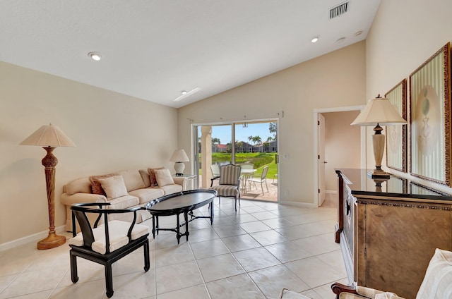 living area featuring light tile patterned floors, baseboards, high vaulted ceiling, and recessed lighting