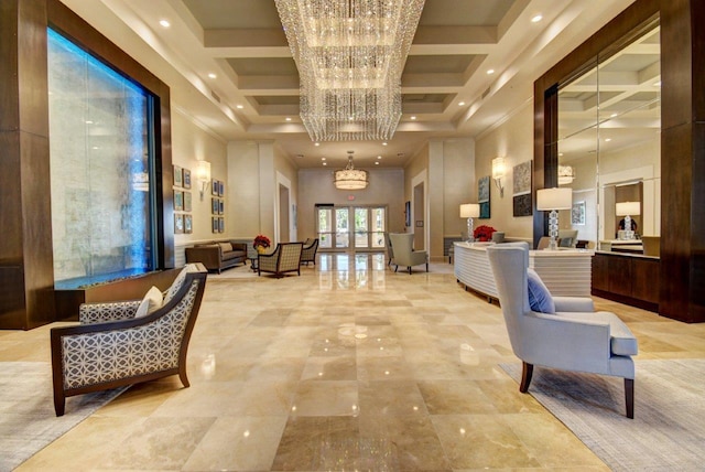 community lobby featuring a towering ceiling, coffered ceiling, and beamed ceiling