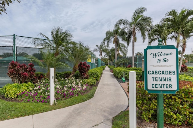 view of community with fence
