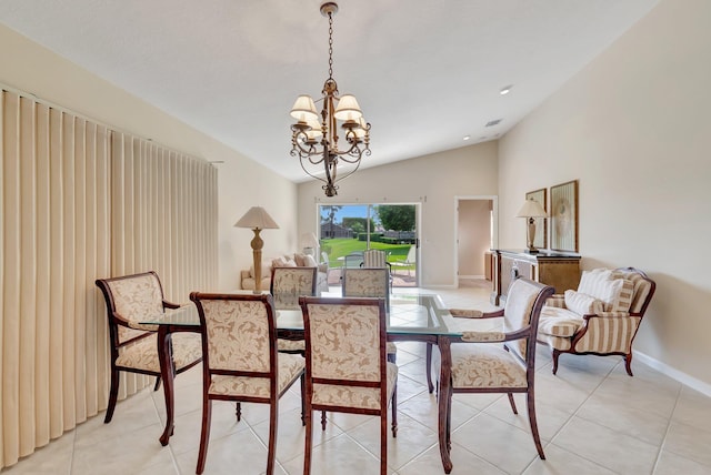 dining space with a chandelier, lofted ceiling, baseboards, and light tile patterned floors