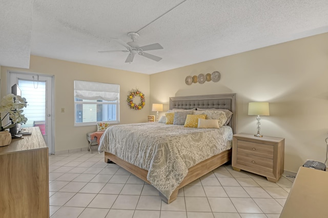 13446 Sabal Palm Ct Unit A, Delray Beach, FL 33484 - bedroom with a textured ceiling, light tile patterned floors, ceiling fan, and baseboards