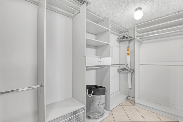 13446 Sabal Palm Ct Unit A, Delray Beach, FL 33484 - spacious closet featuring light tile patterned floors