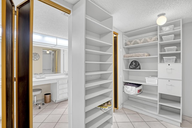 13446 Sabal Palm Ct Unit A, Delray Beach, FL 33484 - walk in closet with light tile patterned flooring
