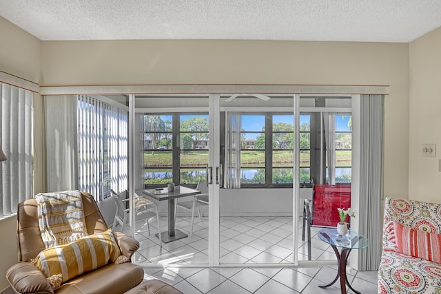 13446 Sabal Palm Ct Unit A, Delray Beach, FL 33484 - sunroom / solarium with a textured ceiling, tile patterned floors, and french doors