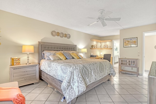 13446 Sabal Palm Ct Unit A, Delray Beach, FL 33484 - bedroom with light tile patterned floors, ceiling fan, connected bathroom, and a textured ceiling