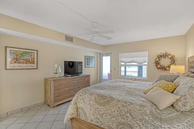 13446 Sabal Palm Ct Unit A, Delray Beach, FL 33484 - bedroom featuring light tile patterned floors, a ceiling fan, and baseboards