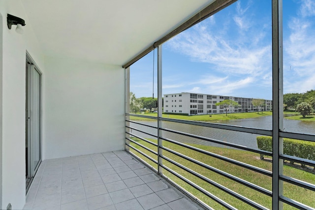 balcony featuring a water view