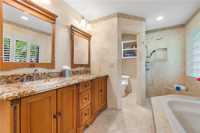 full bath with healthy amount of natural light, toilet, a bath, a walk in shower, and recessed lighting