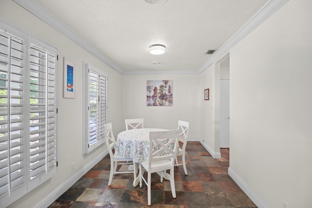 2414 SW Love Ct, Palm City, FL 34990 - dining area with stone finish flooring, baseboards, ornamental molding, and a textured ceiling