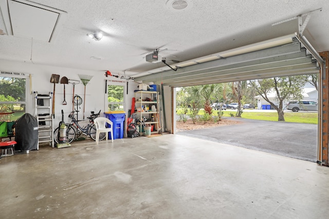 2414 SW Love Ct, Palm City, FL 34990 - garage with a garage door opener