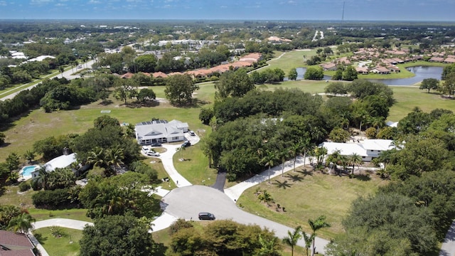 2414 SW Love Ct, Palm City, FL 34990 - aerial view of property's location featuring a nearby body of water and nearby suburban area