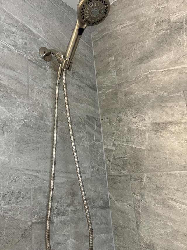 bathroom view of tiled shower