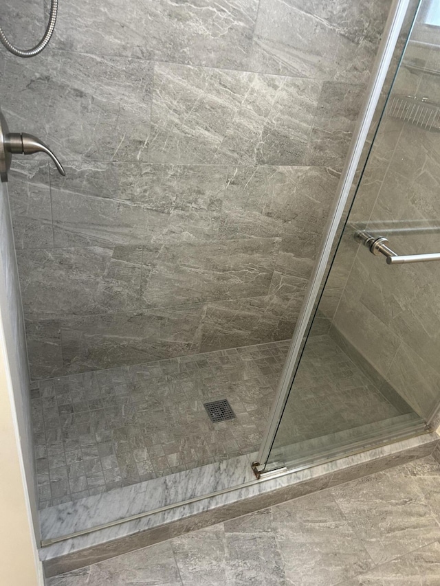 full bath featuring a stall shower