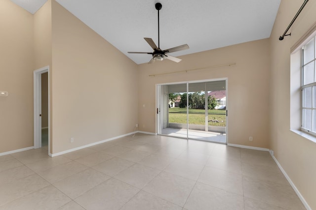 6616 Marissa Cir, Lake Worth, FL 33467 - unfurnished room featuring ceiling fan, high vaulted ceiling, light tile patterned flooring, and baseboards