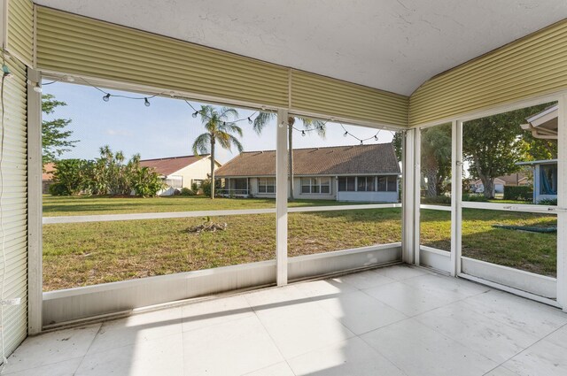6616 Marissa Cir, Lake Worth, FL 33467 - unfurnished sunroom with healthy amount of natural light and lofted ceiling