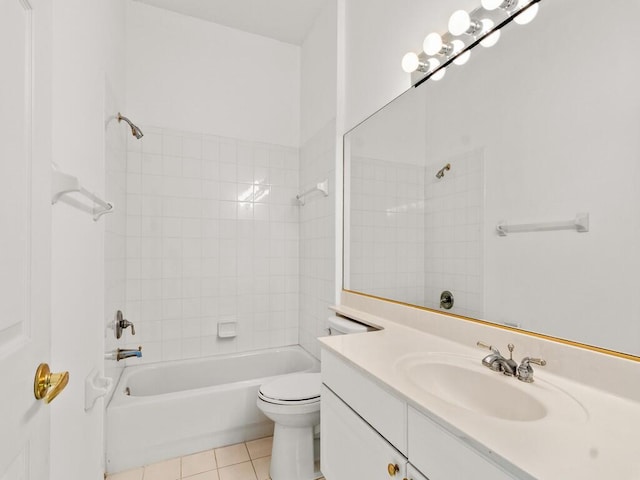 full bathroom with tile patterned floors, toilet, washtub / shower combination, and vanity