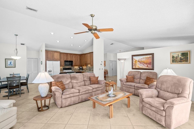 living area with lofted ceiling, a ceiling fan, light tile patterned floors, and recessed lighting