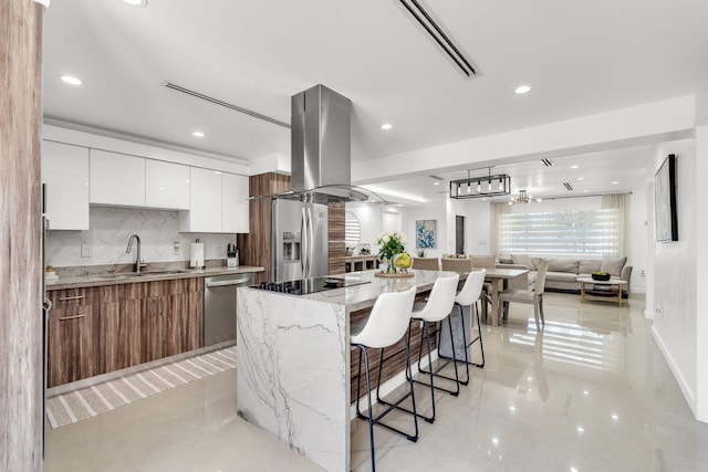 11290 SW 48th St, Miami, FL 33165 - kitchen with a sink, modern cabinets, appliances with stainless steel finishes, island exhaust hood, and white cabinets