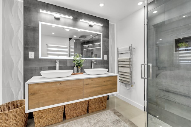 11290 SW 48th St, Miami, FL 33165 - full bathroom featuring radiator, finished concrete floors, a shower stall, double vanity, and recessed lighting