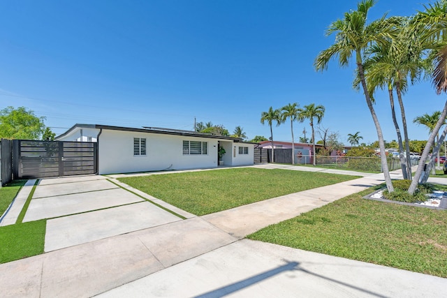 11290 SW 48th St, Miami, FL 33165 - single story home with concrete driveway, stucco siding, and a gate