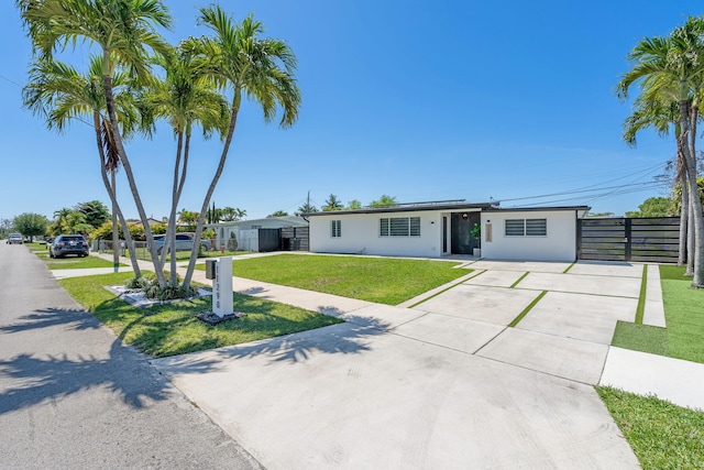 11290 SW 48th St, Miami, FL 33165 - view of front of home featuring driveway and stucco siding