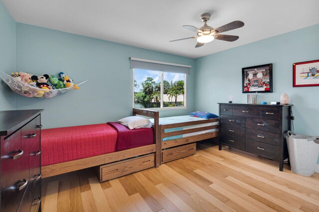 6851 Giralda Cir, Boca Raton, FL 33433 - bedroom with light wood-style flooring and ceiling fan