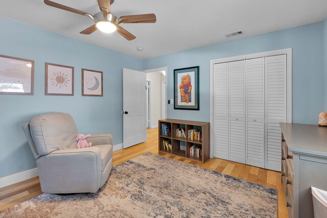 6851 Giralda Cir, Boca Raton, FL 33433 - sitting room with baseboards, ceiling fan, and light wood-type flooring