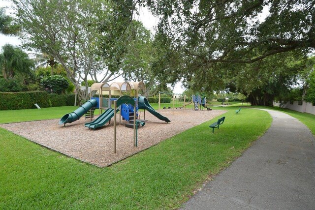 6851 Giralda Cir, Boca Raton, FL 33433 - community playground featuring a lawn