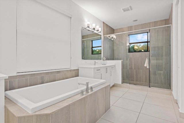 17516 Rainstream Rd, Boca Raton, FL 33496 - bathroom featuring a shower stall, vanity, a garden tub, and tile patterned flooring