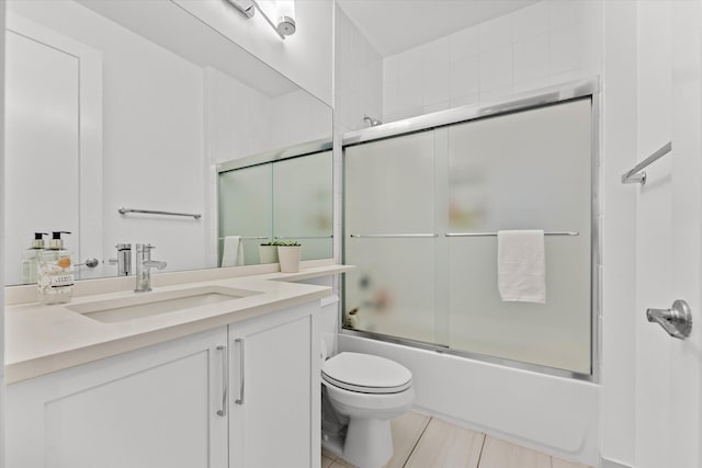 17516 Rainstream Rd, Boca Raton, FL 33496 - bathroom with enclosed tub / shower combo, tile patterned flooring, vanity, and toilet