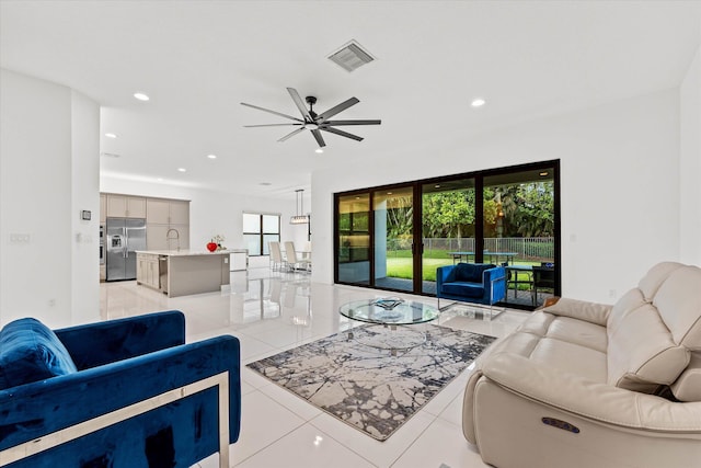 17516 Rainstream Rd, Boca Raton, FL 33496 - living area featuring recessed lighting, light tile patterned floors, and ceiling fan