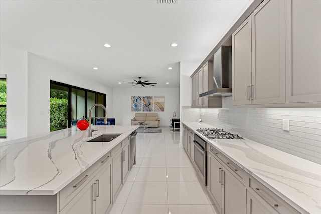 17516 Rainstream Rd, Boca Raton, FL 33496 - kitchen featuring wall chimney range hood, a sink, appliances with stainless steel finishes, backsplash, and recessed lighting