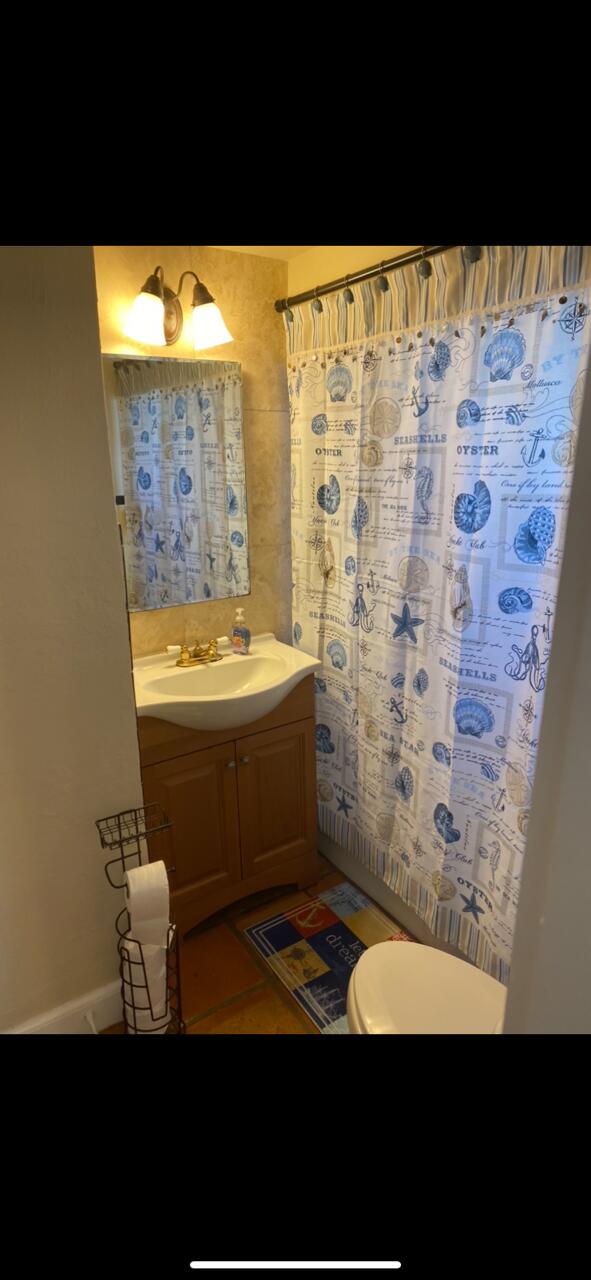 827 Mcintosh St, West Palm Beach, FL 33405 - bathroom featuring vanity and toilet