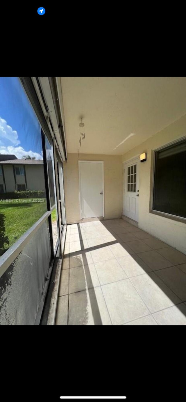 307 Pine Ridge Cir Unit C1, Greenacres, FL 33463 - view of unfurnished sunroom