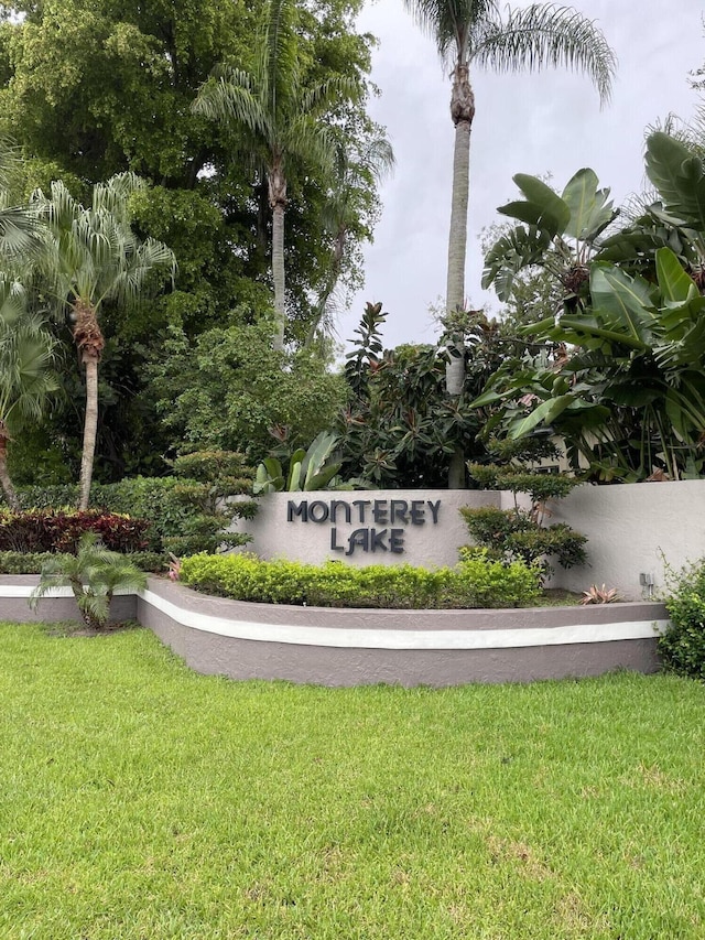 5465 Monterey Cir Unit B, Delray Beach, FL 33484 - community / neighborhood sign featuring a lawn