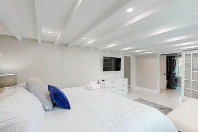 1760 Bel Air Ave, Lauderdale By The Sea, FL 33062 - bedroom with stacked washing machine and dryer, beam ceiling, and recessed lighting