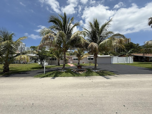1760 Bel Air Ave, Lauderdale By The Sea, FL 33062 - obstructed view of property with driveway