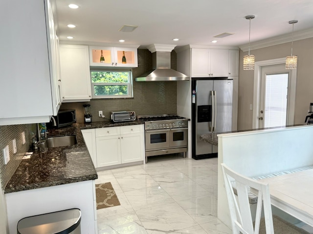 1760 Bel Air Ave, Lauderdale By The Sea, FL 33062 - kitchen with wall chimney exhaust hood, appliances with stainless steel finishes, light marble finish floors, tasteful backsplash, and dark stone counters