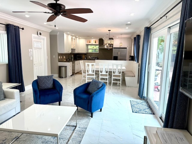 1760 Bel Air Ave, Lauderdale By The Sea, FL 33062 - living area with light marble finish floors, crown molding, recessed lighting, a ceiling fan, and a chandelier