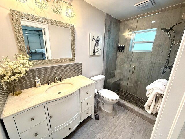 1760 Bel Air Ave, Lauderdale By The Sea, FL 33062 - bathroom featuring decorative backsplash, a stall shower, and vanity