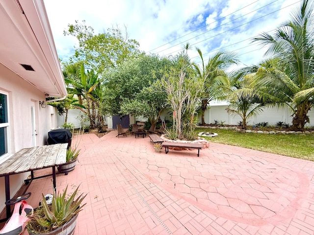 1760 Bel Air Ave, Lauderdale By The Sea, FL 33062 - fenced backyard with outdoor dining area and a patio
