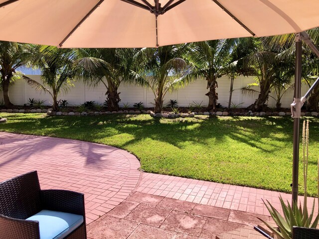 1760 Bel Air Ave, Lauderdale By The Sea, FL 33062 - fenced backyard with a patio