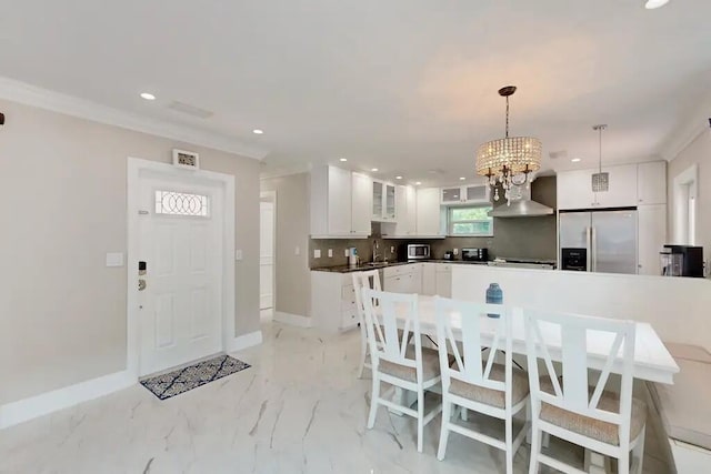 1760 Bel Air Ave, Lauderdale By The Sea, FL 33062 - kitchen featuring stainless steel appliances, wall chimney exhaust hood, white cabinets, recessed lighting, and glass insert cabinets