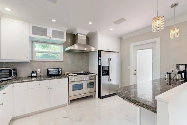 1760 Bel Air Ave, Lauderdale By The Sea, FL 33062 - kitchen with stainless steel appliances, wall chimney exhaust hood, light marble finish floors, tasteful backsplash, and recessed lighting