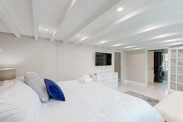 1760 Bel Air Ave, Lauderdale By The Sea, FL 33062 - bedroom with stacked washer / drying machine, beamed ceiling, and recessed lighting