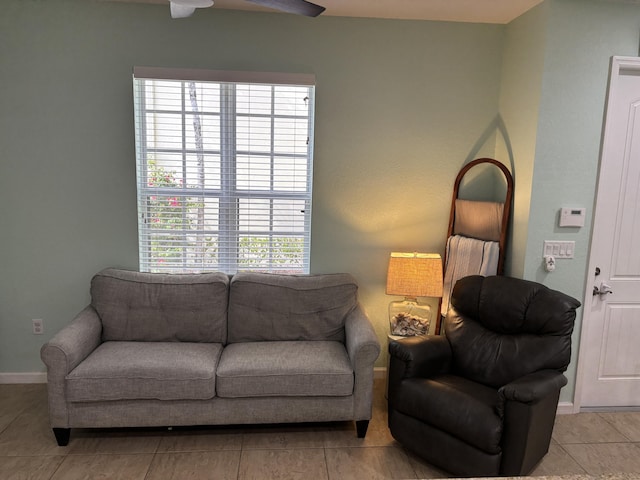 275 SW 7th Ct, Pompano Beach, FL 33060 - living room featuring baseboards, a ceiling fan, and light tile patterned floors
