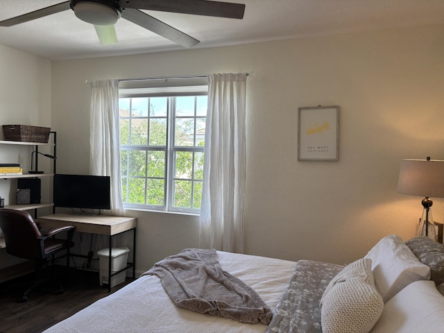 275 SW 7th Ct, Pompano Beach, FL 33060 - bedroom with wood finished floors, an office area, and a ceiling fan