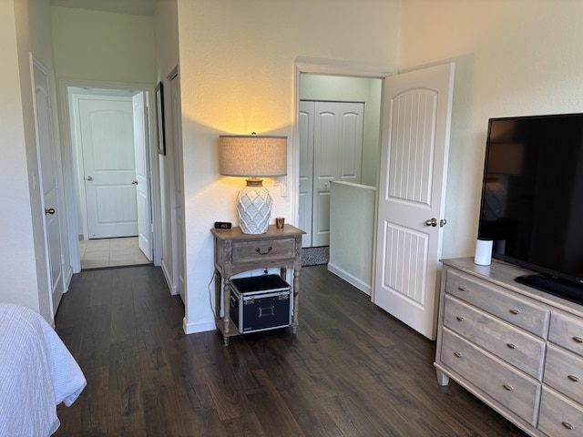 275 SW 7th Ct, Pompano Beach, FL 33060 - bedroom with dark wood-style flooring and baseboards