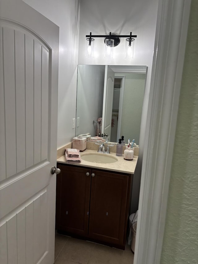 275 SW 7th Ct, Pompano Beach, FL 33060 - bathroom featuring tile patterned flooring and vanity